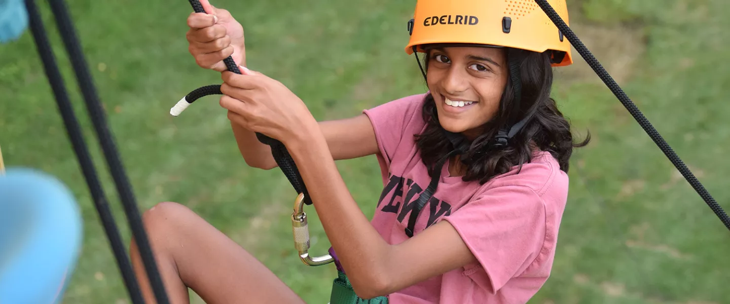 Camper on the climbing wall