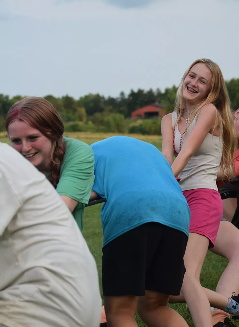 Campers playing tug of war