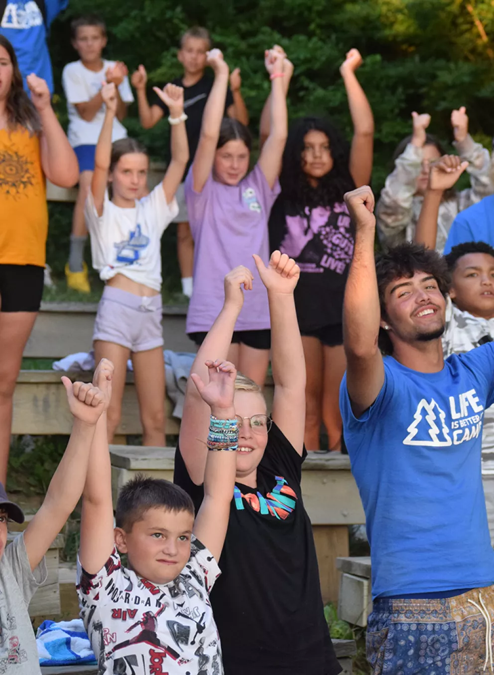 campers and staff cheering