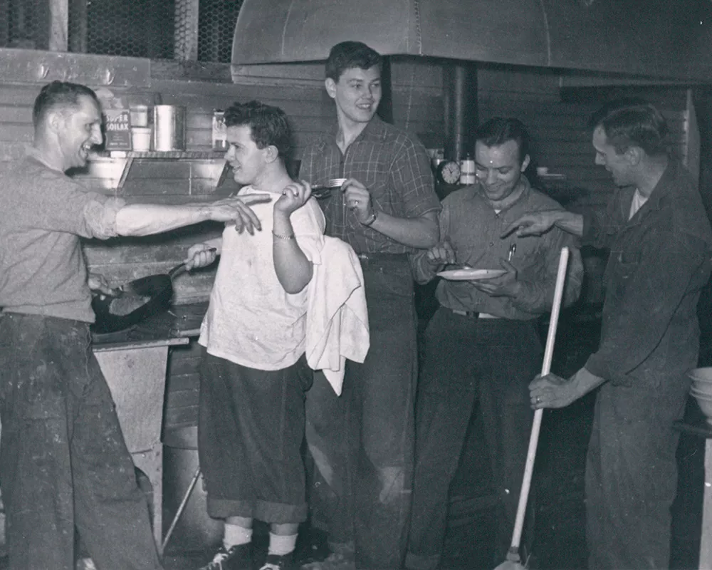 historical photo of adult campers