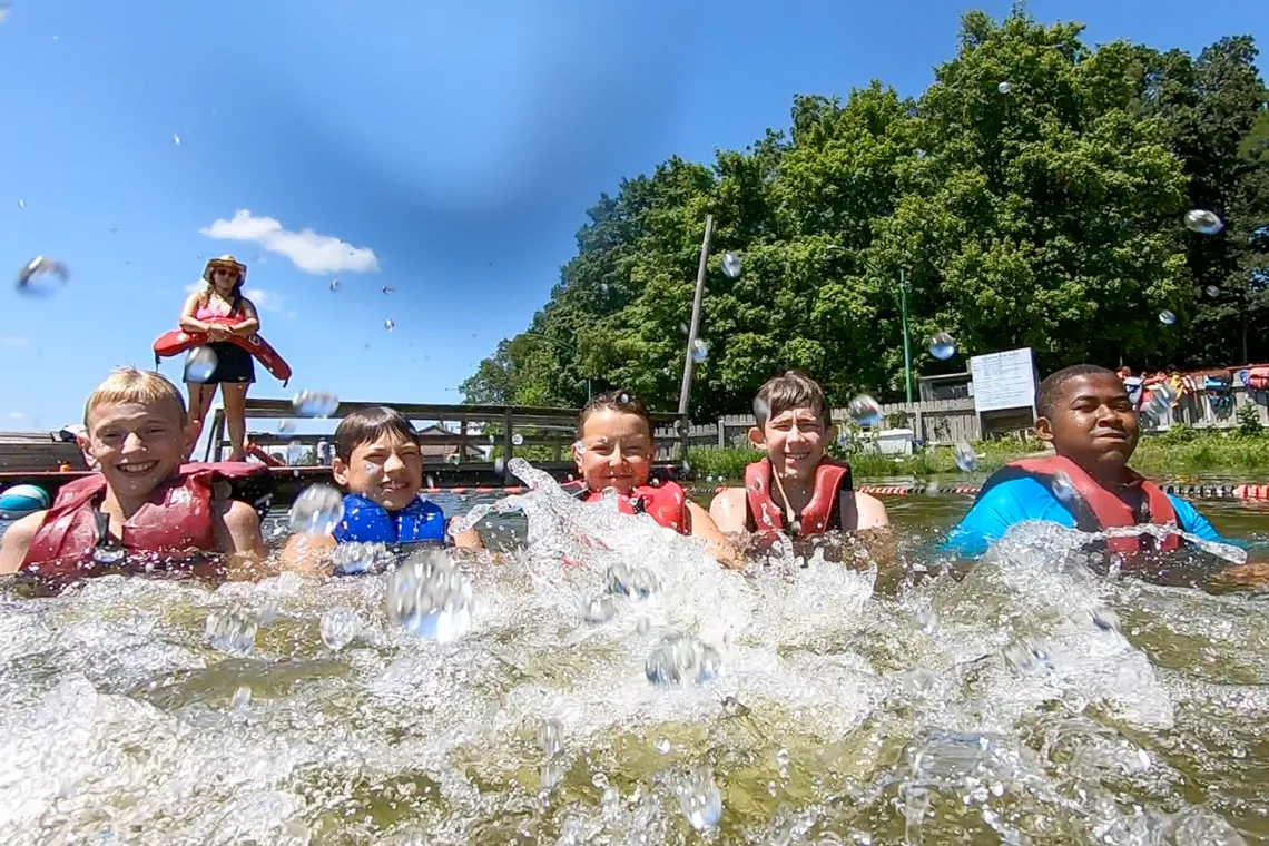 Campers splashing in the water