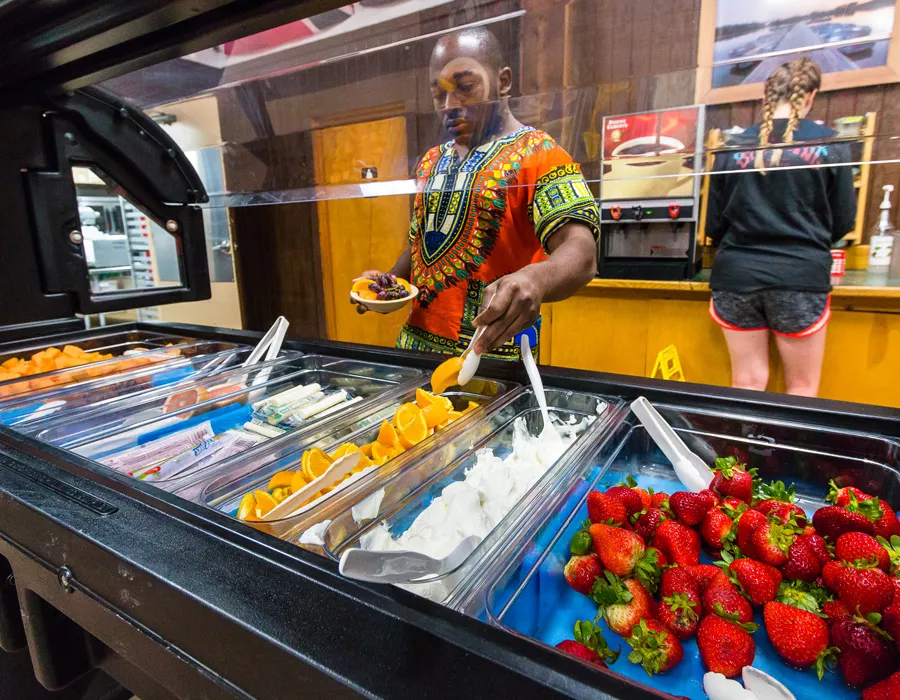 person choosing fruit