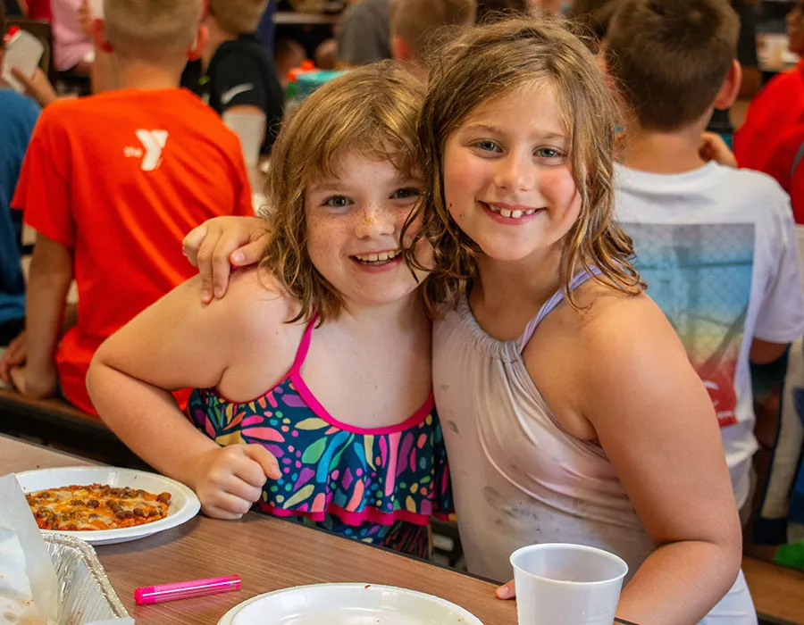 campers posing while eating