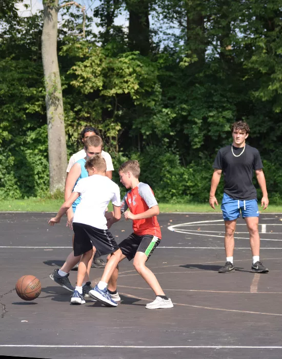 Campers playing basketball