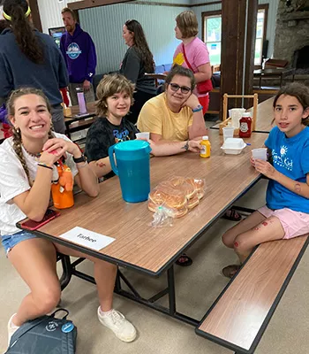 Group of campers and counselors in dining hall