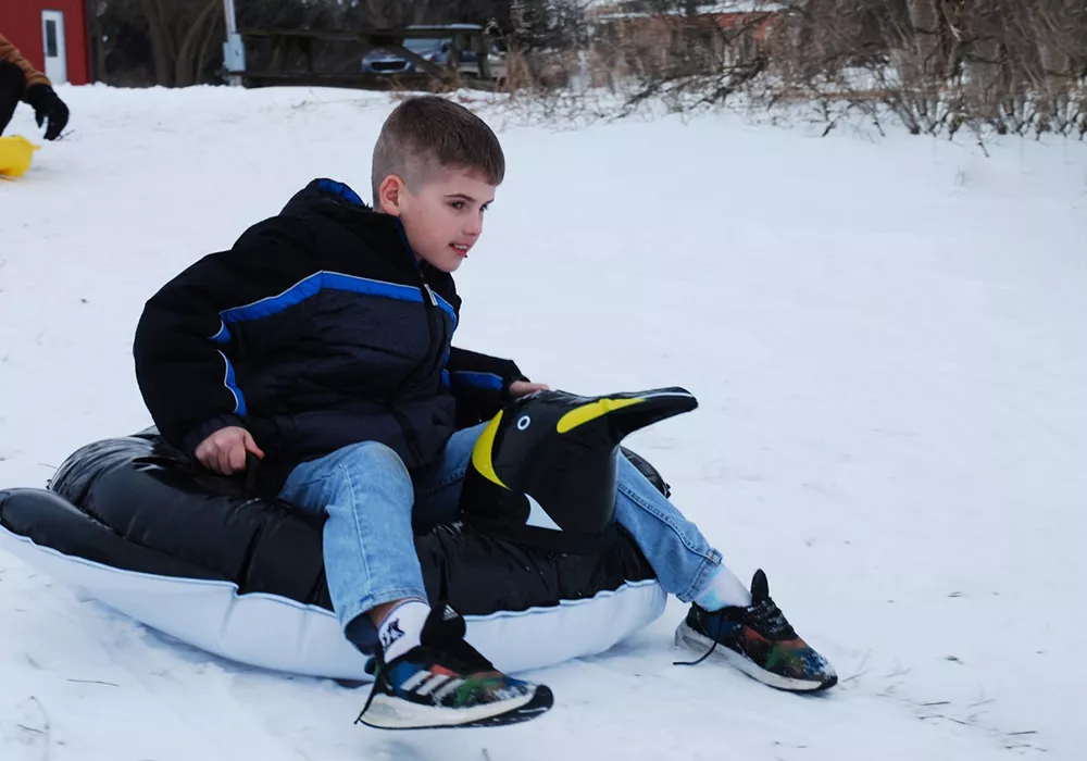 camper tobogganing