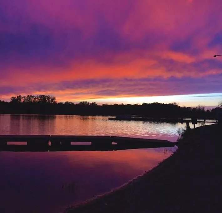 sunset over the lake at camp